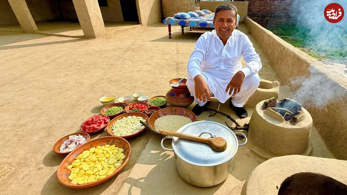 (ویدئو) غذای روستایی در پاکستان؛ پخت پلو مخلوط محلی با سبزیجات