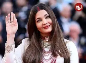 عکس| سفر در زمان؛ «آیشواریا رای» در کنار یک کارگردان و در جشنواره فیلم کن؛ سال 1381