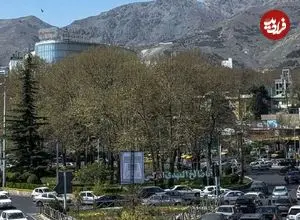 عکس| سفر به تهران قدیم؛ نمایی از سرپل تجریش در یک روز برفی؛ سال 1363
