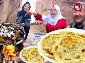 ببینید| غذای روستایی در افغانستان؛ پخت خوراک بادمجان و نان تازه
