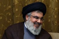 عکس| سفر در زمان؛ «سیدحسن نصرالله» در حال سان دیدن از نیروهای حزب‌الله؛ دهه 60