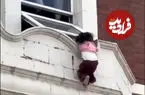 ببینید| نجات معجزه‌آسای دختربچه از سقوط از بالکن آپارتمان