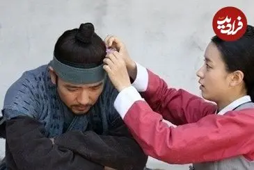 عکس| سفر زمان؛ «دونگ‌یی و چانسو» با لباس شخصی در حال قدم زدن در خیابان