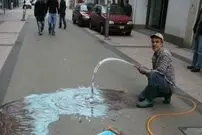 عکس؛ هنر خیابانی؛ شاهکار خلاقانۀ هنرمندی که «اقیانوس» را به وسط شهر آورده است