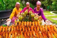 ببینید| غذای روستایی در سنگاپور؛ پخت غذا با میگو و سبزیجات در نارگیل روی آتش