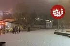 عکس| سفر زمان؛ کودکان تهرانی در حال غلتاندن گلوله‌ برفی غول‌پیکر؛ سال 80
