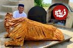 (ویدئو) فرآیند پخت یک گاو 200 کیلوگرمی در تنور به سبک آشپز مشهور پاکستانی