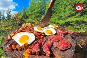 ببینید| غذای روستایی در انگلستان؛ پخت استیک با سیب زمینی سرخ کرده در جنگل