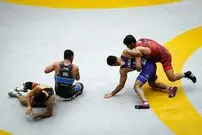 عکس؛ تشکیل صف در عربستان برای گرفتن عکس با دو ستاره کشتی ایران