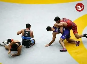 عکس؛ تشکیل صف در عربستان برای گرفتن عکس با دو ستاره کشتی ایران