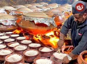 (ویدئو) غذای خیابانی در پاکستان؛ مراحل پخت چلو مرغ کوزه ای به سبک هندی ها