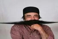 (عکس) اندازه عجیب رکورددارِ درازترین سبیل جهان در بوشهر