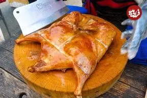 ببینید| غذای خیابانی در تایلند؛ تهیه محبوب ترین اردک کبابی در بانکوک