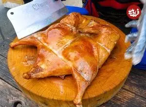 ببینید| غذای خیابانی در تایلند؛ تهیه محبوب ترین اردک کبابی در بانکوک