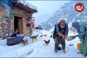ببینید| غذای روستایی در افغانستان؛ پخت نان سنتی در کوهستان برفی