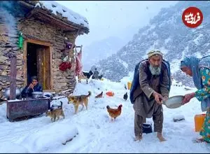 ببینید| غذای روستایی در افغانستان؛ پخت نان سنتی در کوهستان برفی