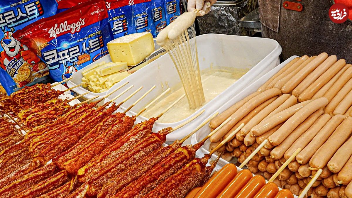 ببینید؛ غذای خیابانی در کره؛ پخت هات داگ سوخاری با پنیر در سئول
