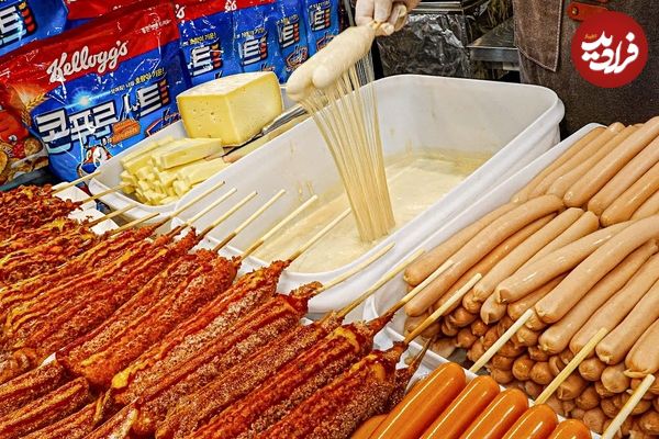 ببینید؛ غذای خیابانی در کره؛ پخت هات داگ سوخاری با پنیر در سئول