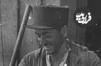 عکس| سفر زمان؛ «ماهیگیر بابلسری» در حال تمیز کردن روده ماهی؛ سال 1313