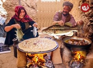 (ویدئو) طبخ دیدنی نان روی ساج و ماهی قزل آلا به سبک زوج روستایی افغانستانی