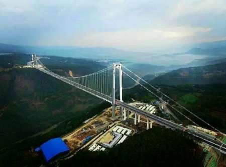 تصاویر/ ساخت مرتفع‌ترین پل معلق آسیا در چین