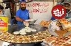 ببینید| غذای خیابانی در پاکستان؛ تهیه شامی برگر با تخم مرغ در کراچی