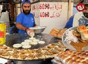ببینید| غذای خیابانی در پاکستان؛ تهیه شامی برگر با تخم مرغ در کراچی