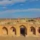 عکس| سفر زمان؛ گلۀ گوسفندان در حال استراحت در نزدیکی کاروانسرای علی‌آباد قم؛ 140 سال قبل