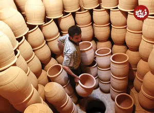 عکس| سفر به تهران قدیم؛ یک مغازه ظروف سفالی و شیشه ای در خیابان 15 خرداد؛ سال 1339