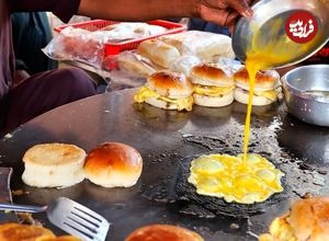 ببینید؛ غذای خیابانی در پاکستان؛ پخت ساندویچ برگر با تخم مرغ در کراچی 
