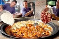 ببینید| غذای خیابانی در پاکستان؛ پخت 600 کیلو کابلی پلوی محبوب در کراچی