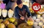 ببینید| غذای خیابانی در مالزی؛ برش نارگیل و تهیه بستنی خامه ای با آن در کوالالامپور