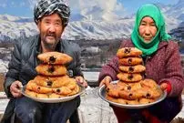 ببینید| غذای روستایی در افغانستان؛ پخت شیرینی سنتی شکلاتی در غار
