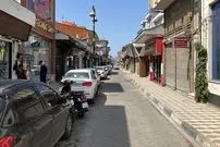 عکس| سفر به ایران قدیم؛ تصویری رنگی شده از «بازار ساحلی بندر انزلی» در اواخر قاجار