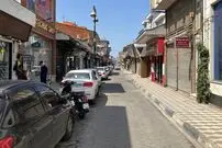 عکس| سفر به ایران قدیم؛ تصویری رنگی شده از «بازار ساحلی بندر انزلی» در اواخر قاجار
