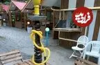 عکس| سفر زمان؛ قلیان کشیدن در یک قهوه‌خانه بین راهی در شمال ایران در دوران قاجار