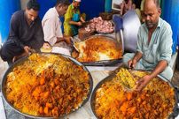 ببینید؛ غذای خیابانی در پاکستان؛ تهیه بریانی تند با مرغ در کراچی