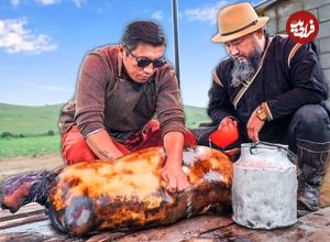 (ویدئو) غذای عشایری در مغولستان؛ پخت 20 کیلو گوشت بز در پوست