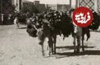 عکس| سفر زمان؛ عبور الاغ‌ها با بار هیزم از دروازۀ شاه‌عبدالعظیم