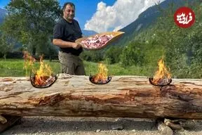 ببینید| غذای روستایی در آذربایجان؛ پخت مرغ، ماهی و گوشت روی تنه درخت