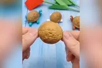 (ویدئو) خلق یک اثر هنری جذاب با پوست گردو
