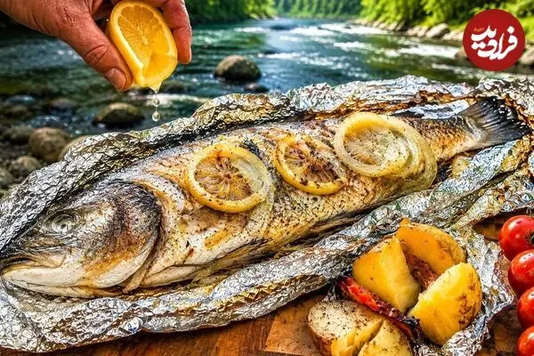 ببینید| غذای روستایی در اوکراین؛ کباب کردن ماهی شکم پر با لیمو در جنگل و در کنار رودخانه