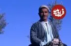 عکس| سفر به ایران قدیم؛ «کاروان شترها» در یکی از خیابان‌های اصفهان؛ 65 سال قبل