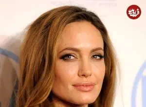 عکس| سرفر در زمان؛ «آنجلینا جولی» و نوزادش در نیویورک؛ سال 1382