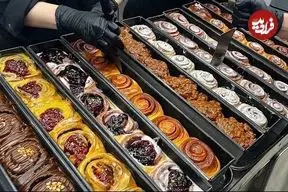 ببینید| غذای خیابانی در کره؛ پخت نان رول دارچینی در سئول