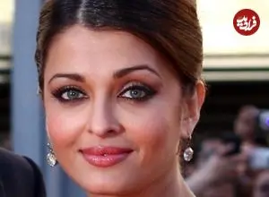 عکس| سفر در زمان؛ ژست خاص «آیشواریا رای» در جشنواره فیلم کن؛ سال 1389