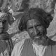 عکس| سفر زمان؛ عکس یادگاری مردان بلوچ در کنار یک نخلستان؛ سال 1330