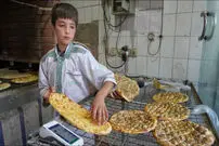 (ویدئو) نان بربری چگونه در ایران پخت می شود؟