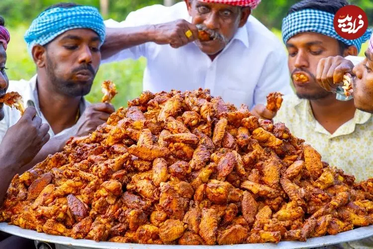 ببینید| غذای روستایی در هند؛ پخت بال مرغ تند و شیرین در طبیعت روستا