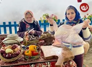 ببینید| غذای روستایی در ایران؛ پخت بوقلمون شکم پر در تنور در روستایی کوهستانی